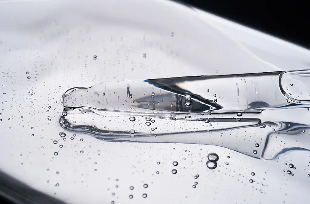 Dip a pipette into a clear gel-like substance